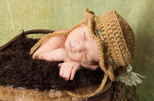 Baby wearing crochet hat