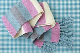 Striped woollen scarf on checked background