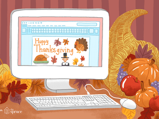 电脑屏幕上的“感恩节快乐”字样和其他剪贴画的插图。它就在聚宝盆旁边