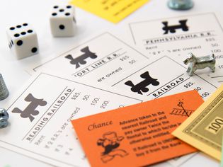 垄断——铁路卡块,钱和骰子