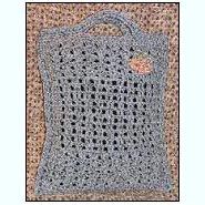贝壳和网状平面手提袋由桑迪·马歇尔