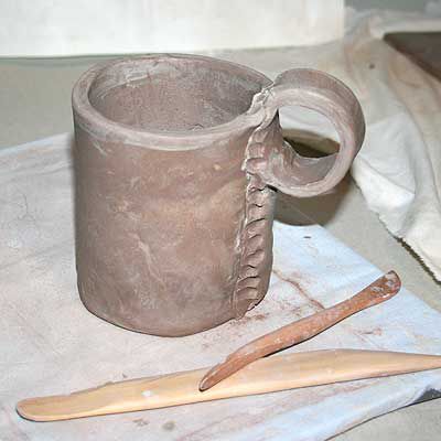 Pottery strap handle