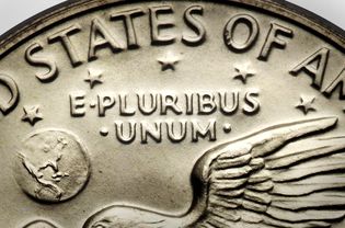 Closeup of 'E Pluribus Unum' on an Eisenhower Silver Dollar