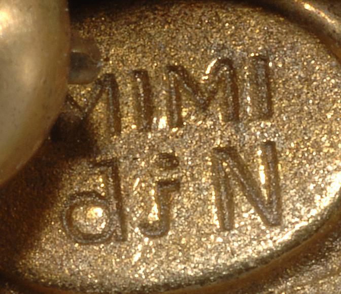 约20世纪60年代Mimi di N服装珠宝标志