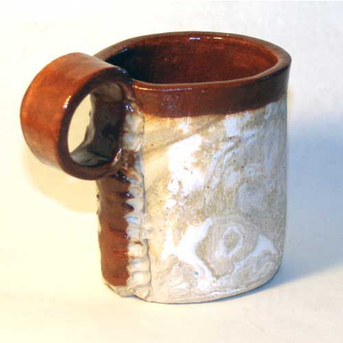 a slab-built pottery mug