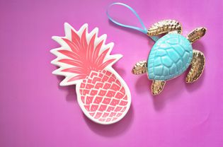 Pineapple coaster next to turtle ornament