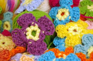 Colorful crochet flower applique