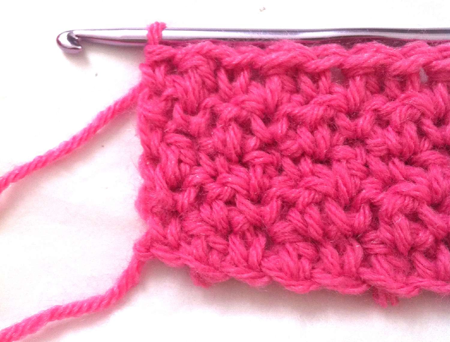 Seed stitch crochet fabric chunk