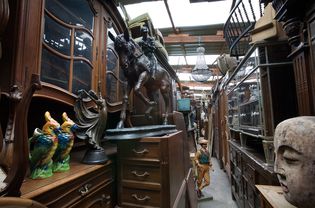 antiques in a narrow corner in a store