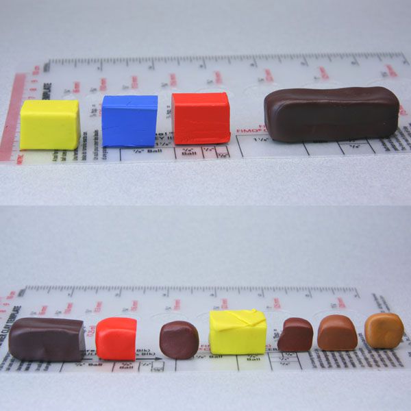 由红色、黄色和蓝色混合制成的各种棕色聚合物粘土，用于玩具屋食品。