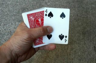 Deck of cards with 4 showing
