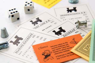 Monopoly - railroad cards, pieces, money and dice
