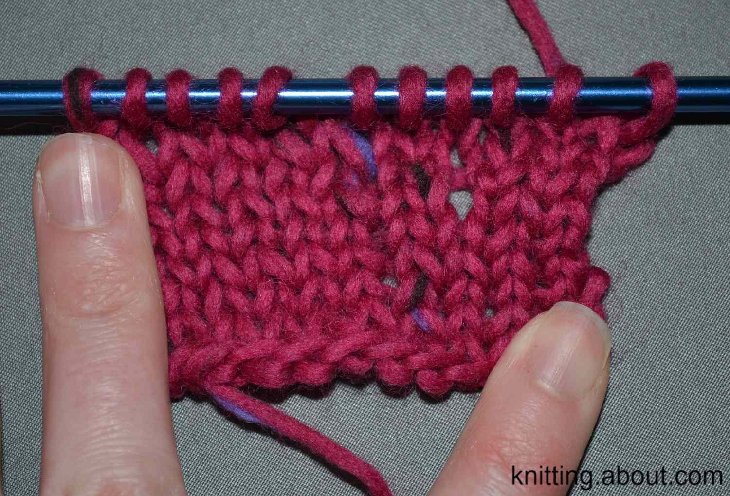 An accidental yarn over might cause a hole