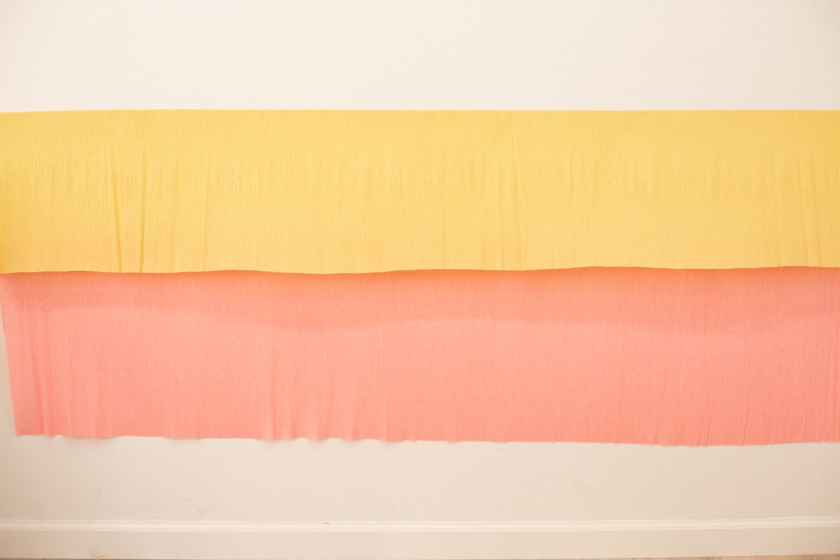 Yellow and peach crepe paper on wall