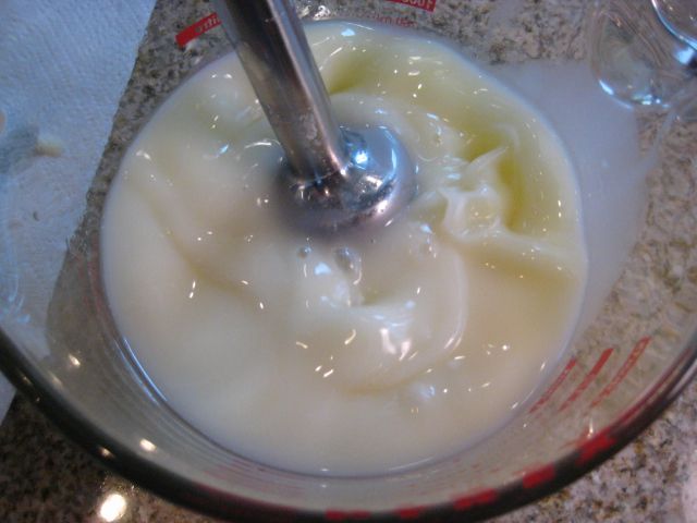 Blending the cream into the melted oils