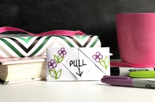 pull tab note with books and markers