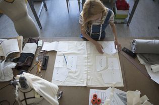 Woman using sewing patterns