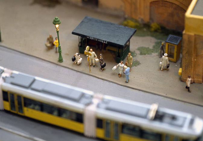 Model of commuters waiting at tram stop