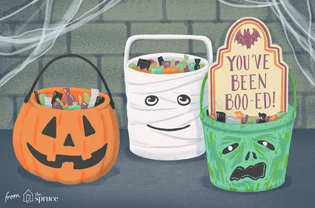 Three Halloween candy buckets