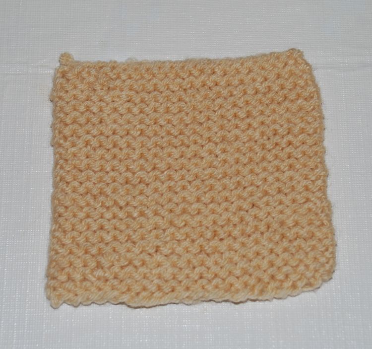 The finished knit square.