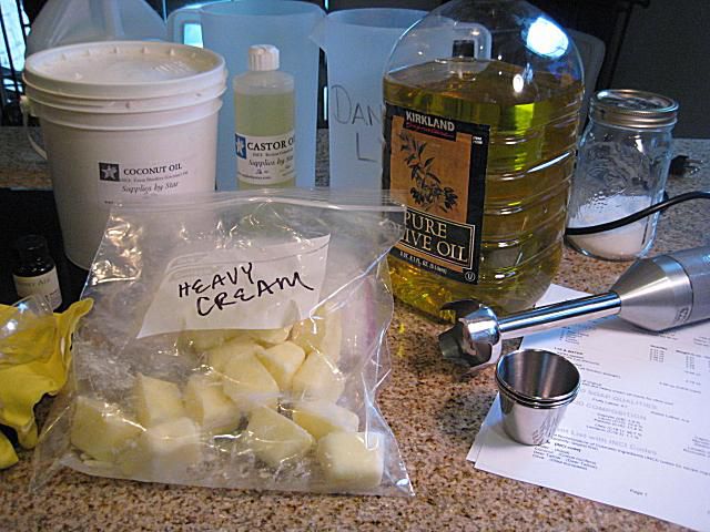 Setup, ingredients and tools for making milk soap with heavy cream