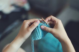 knitting blue yarn