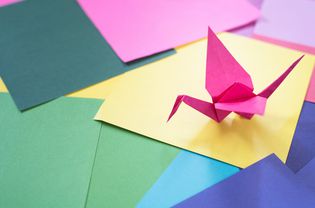High Angle View Of Origami On Colorful Papers
