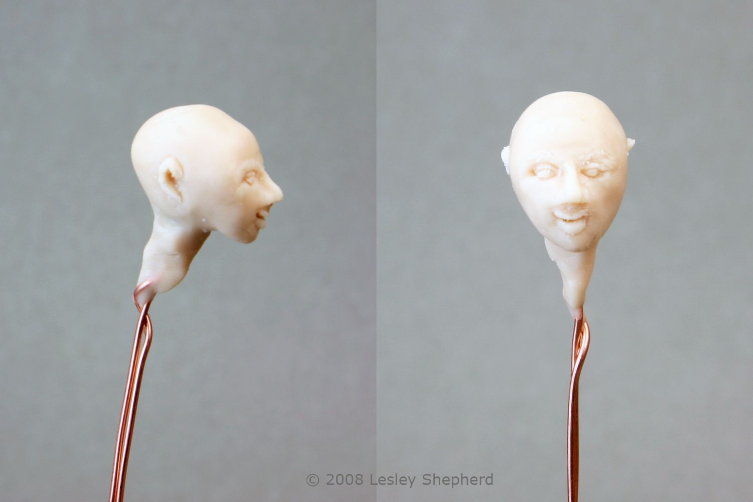 添加一个脖子和消除最后的功能在一个微型娃娃头雕塑