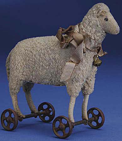 约1910年史泰夫微型绵羊在车轮上