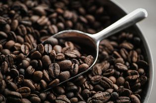 Roasted coffee beans with scooper