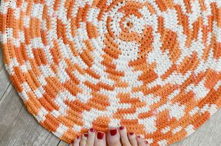 Scrap Yarn Rope Bath Mat With Toes on the Mat