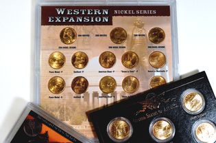 gold-plated United States coins in special packaging.
