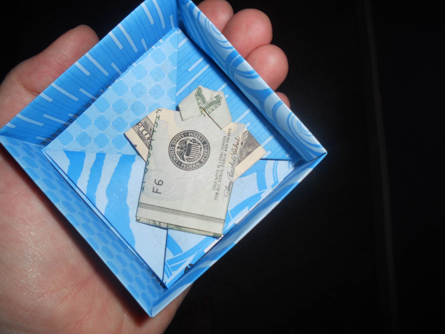A tiny origami money shirt
