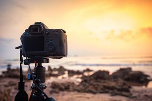 DSLR Camera capturing seascape view in morning