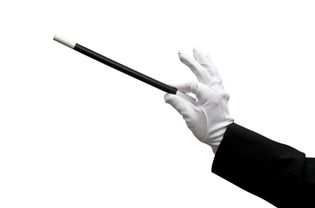 Magician holding wand