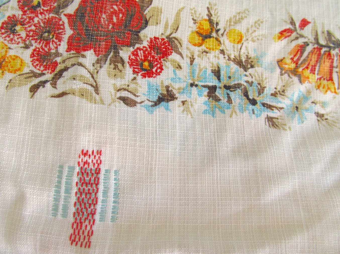 Repairing textiles with stitching