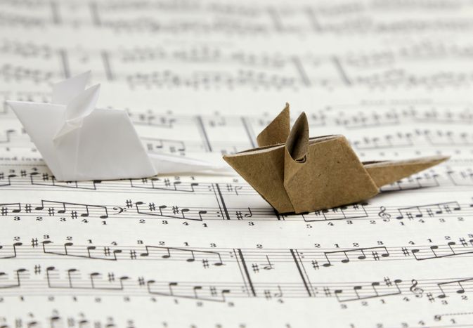 origami mice on music paper