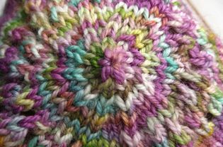 Top detail of a stockinette stitch hat