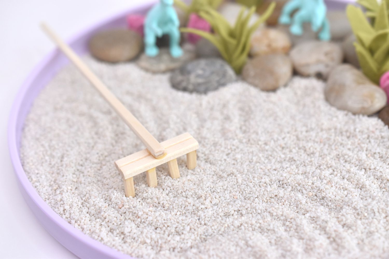 Use the Rake to Make Designs in the Sand