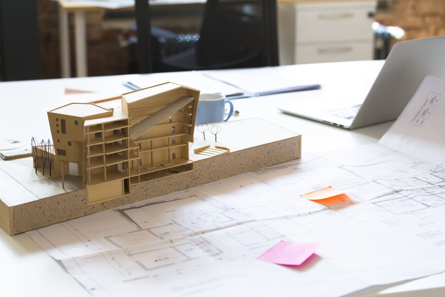 Desk with architectural model