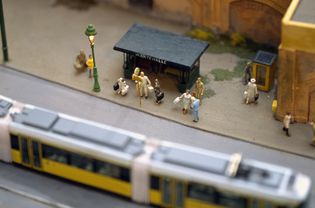 Model of commuters waiting at tram stop