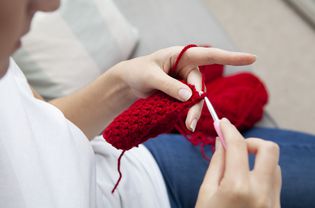 Close-up of hands doing crochet