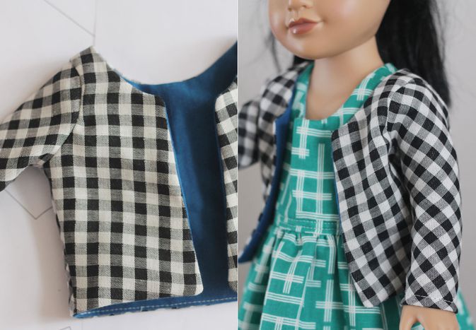 Black-and-white doll jacket with a doll.