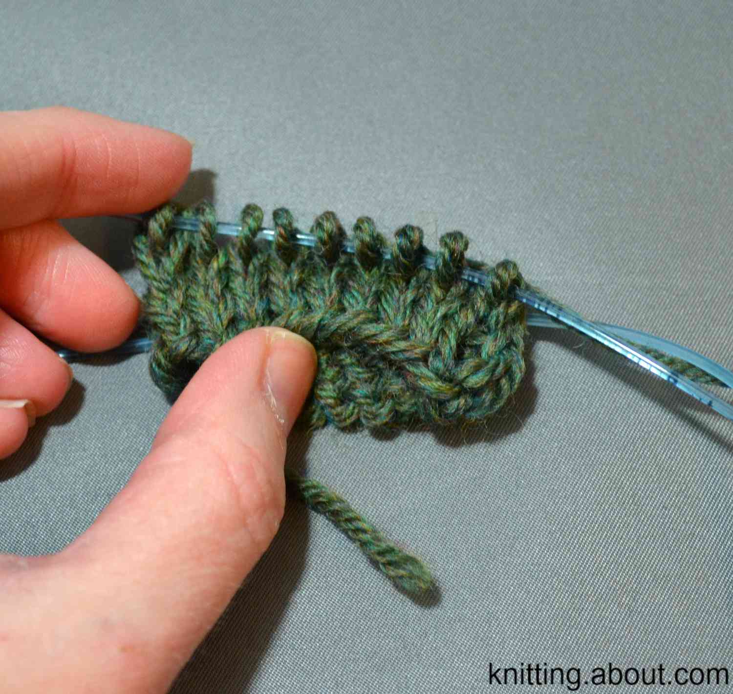 A swatch worked in the round with two circular knitting needles.