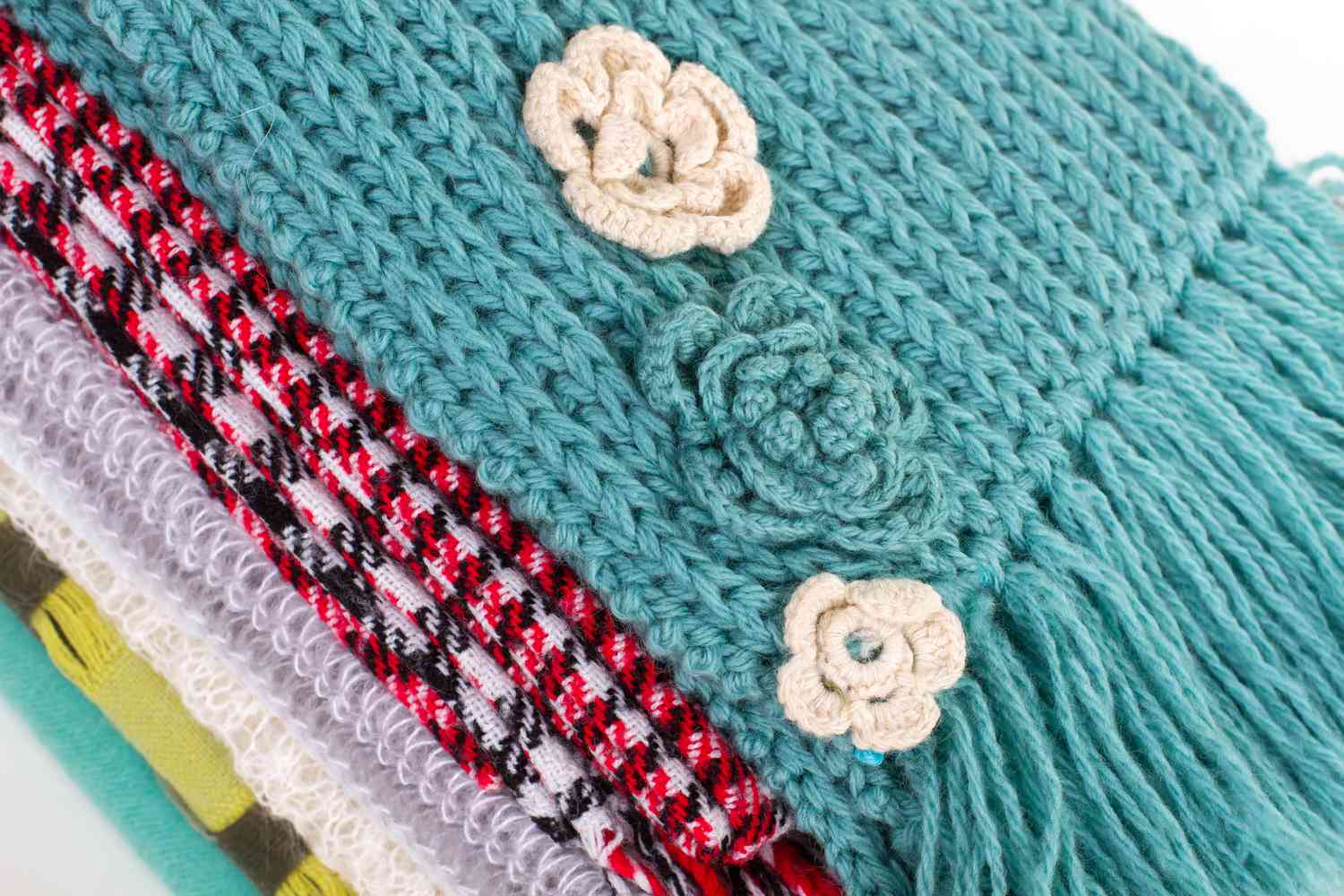 Beautiful crocheted flowers on the scarf.