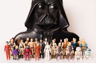 Vintage Star Wars toys and Darth Vader storage case
