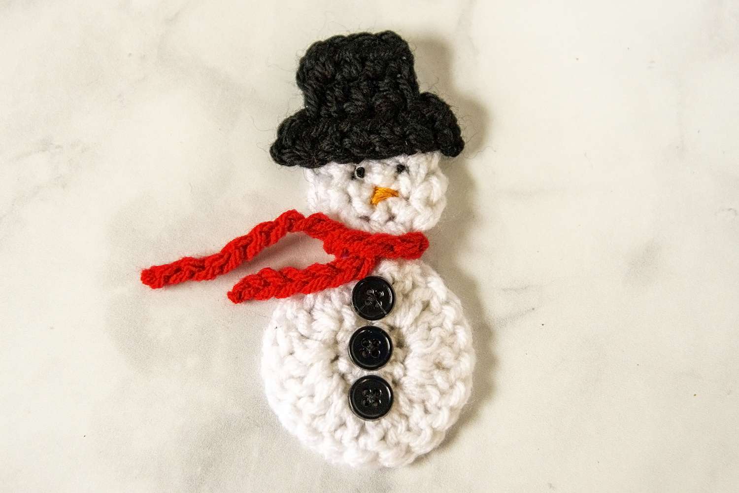 A crocheted snowman