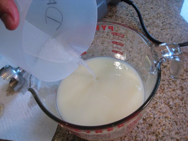 Adding the extra strength lye solution to the cream and oil mixture