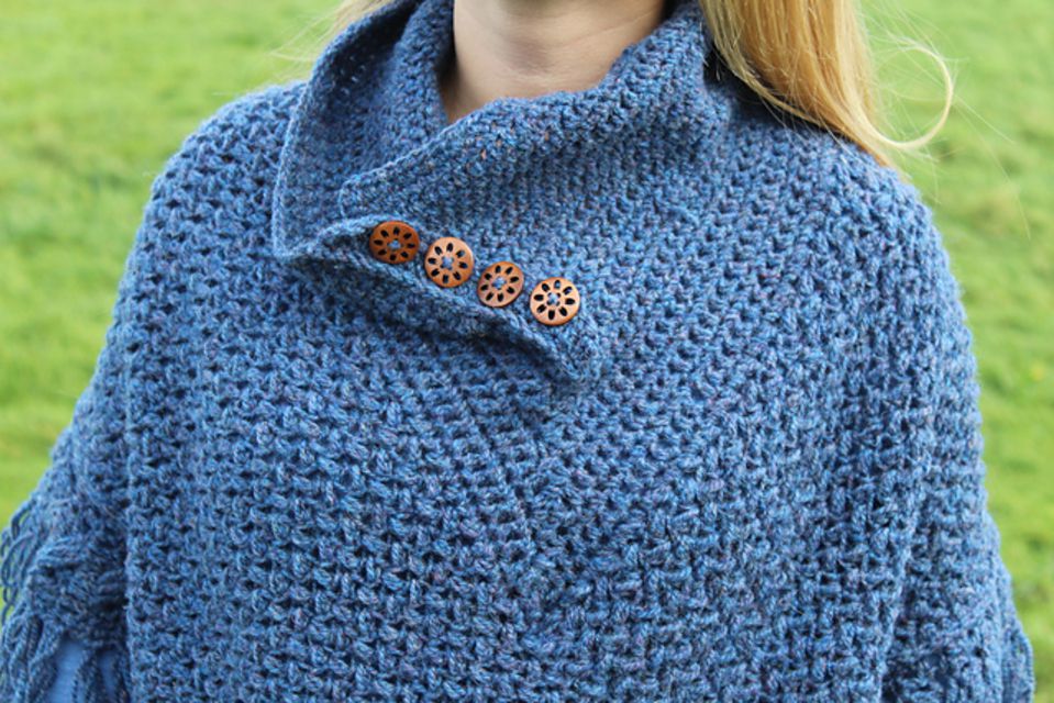 Crochet poncho with buttons