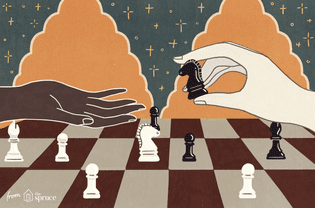 hand handing over chess piece